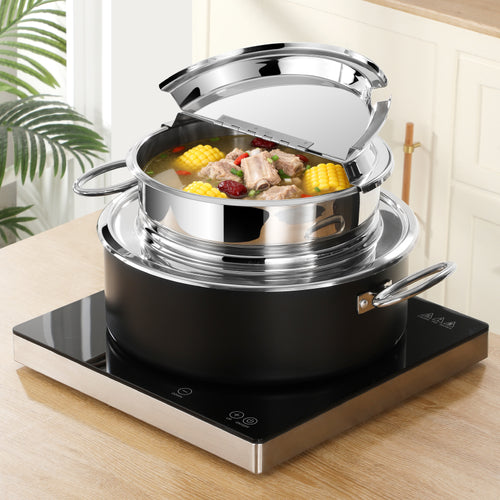 Stainless steel Soup pot with food on a black electric stove in a kitchen setting